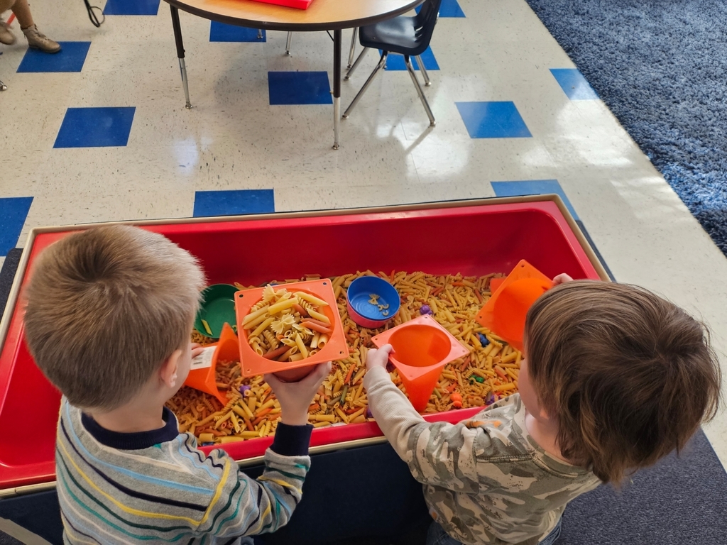 children sifting noodles